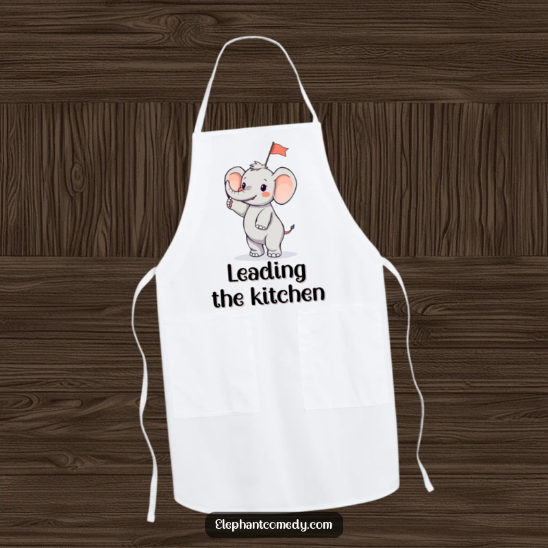 Funny tiny elephant apron featuring a small elephant character standing on its hind legs and waving a small flag, a fun kitchen accessory.